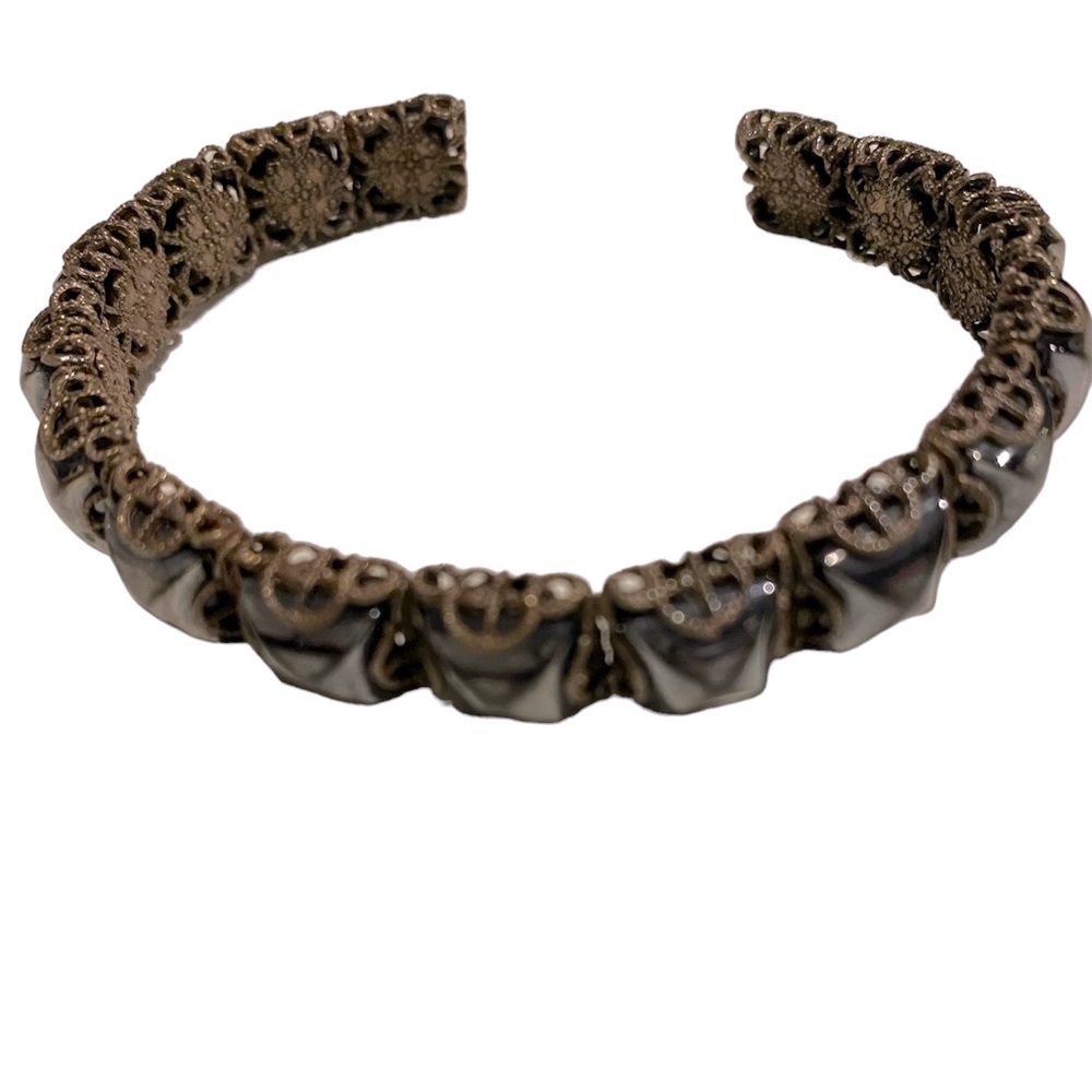 Vintage 80’s jet black glass torque bracelet. Filigree setting.  Adult size